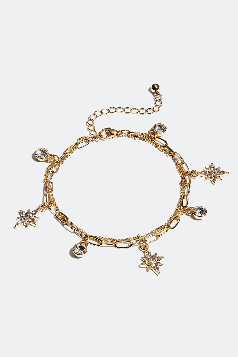 Guldfärgat dubbelarmband med runda glasstenar och stjärnor i gruppen Smycken / Armband / Tunna hos Glitter (251001072002)
