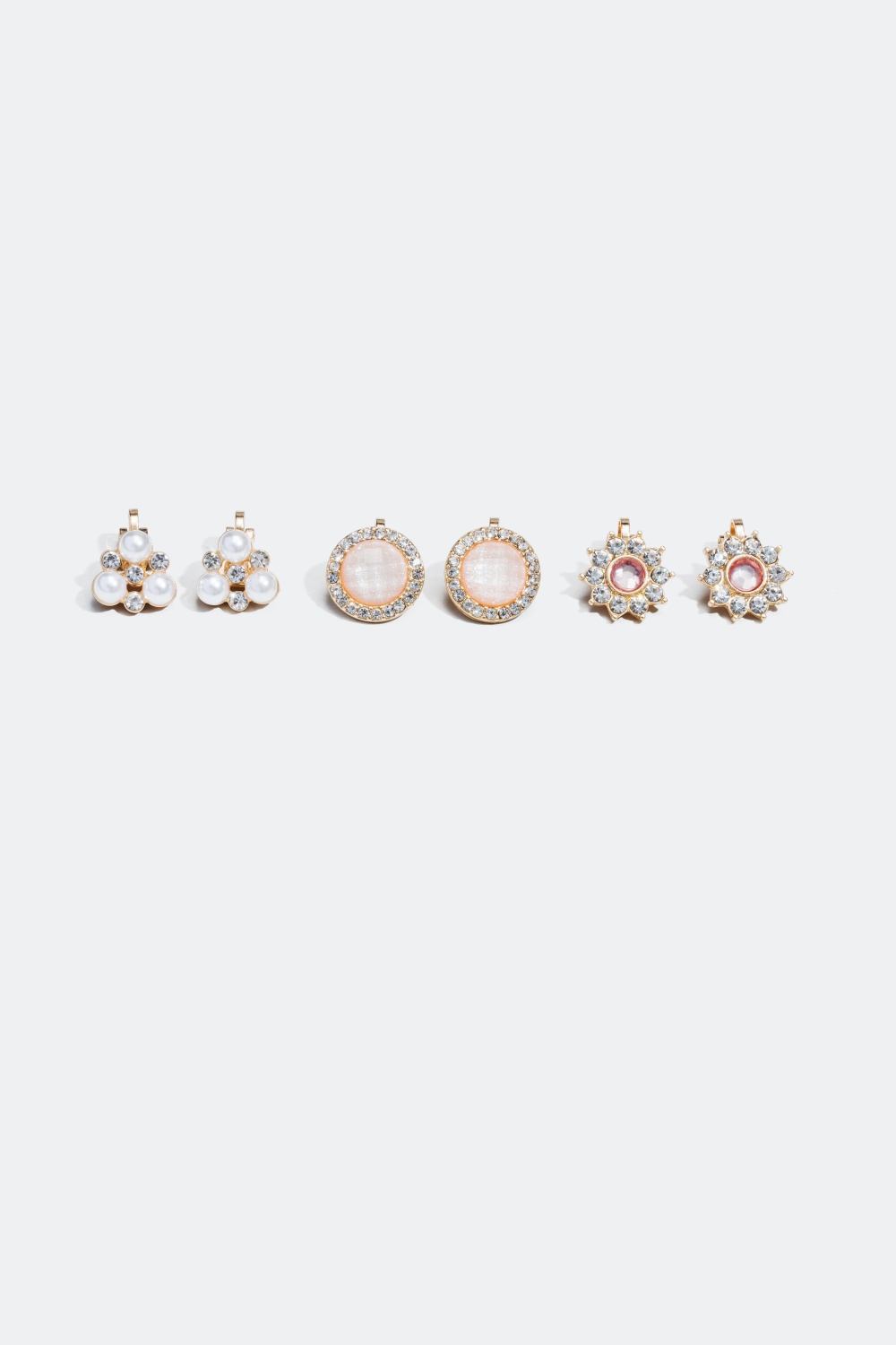 3-pack clipsörhängen i rosa, vita och guldfärgade nyanser i gruppen Smycken / Örhängen hos Glitter (324484)