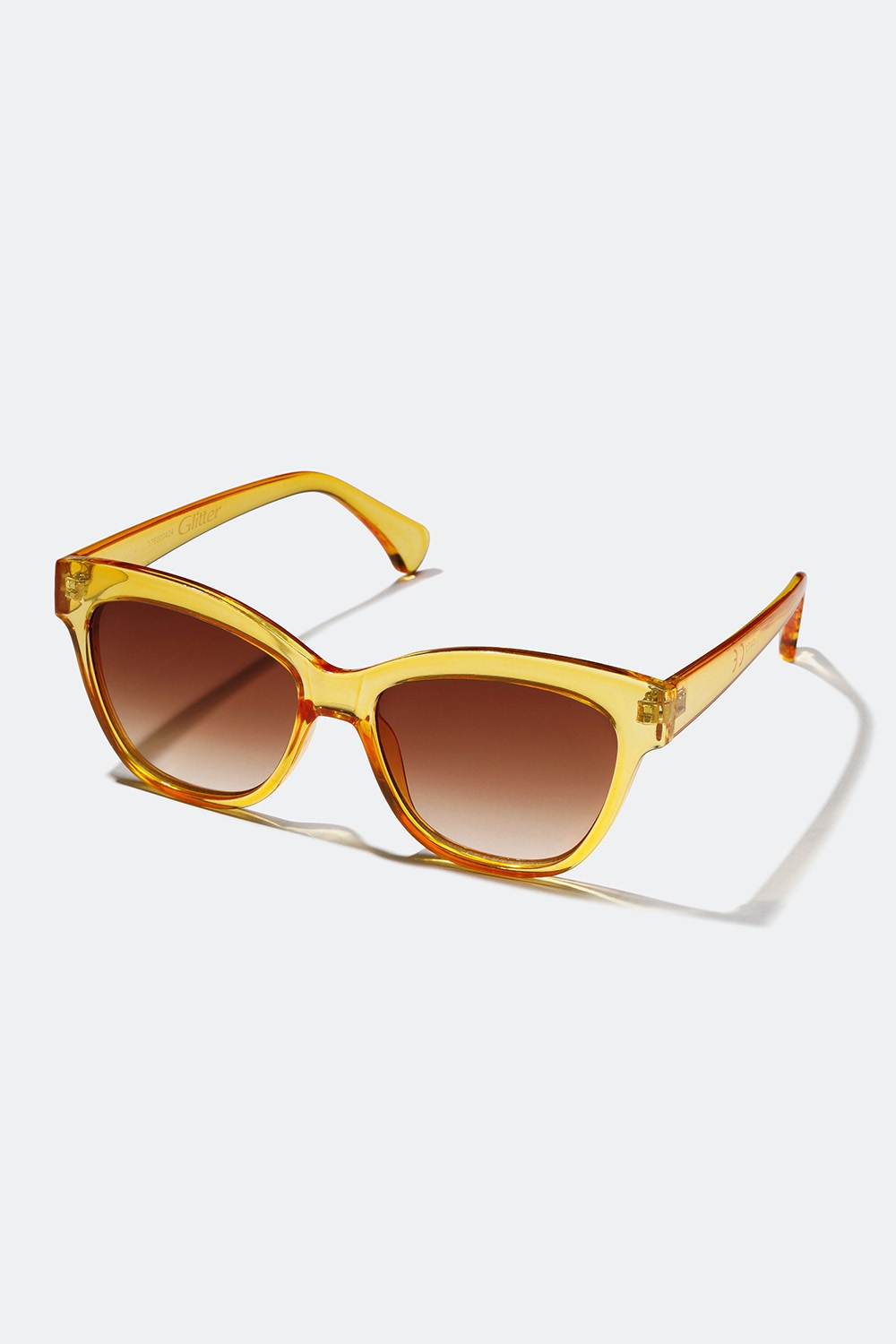 Solglasögon med gula transparenta bågar i gruppen Accessoarer / Solglasögon hos Glitter (176000424100)