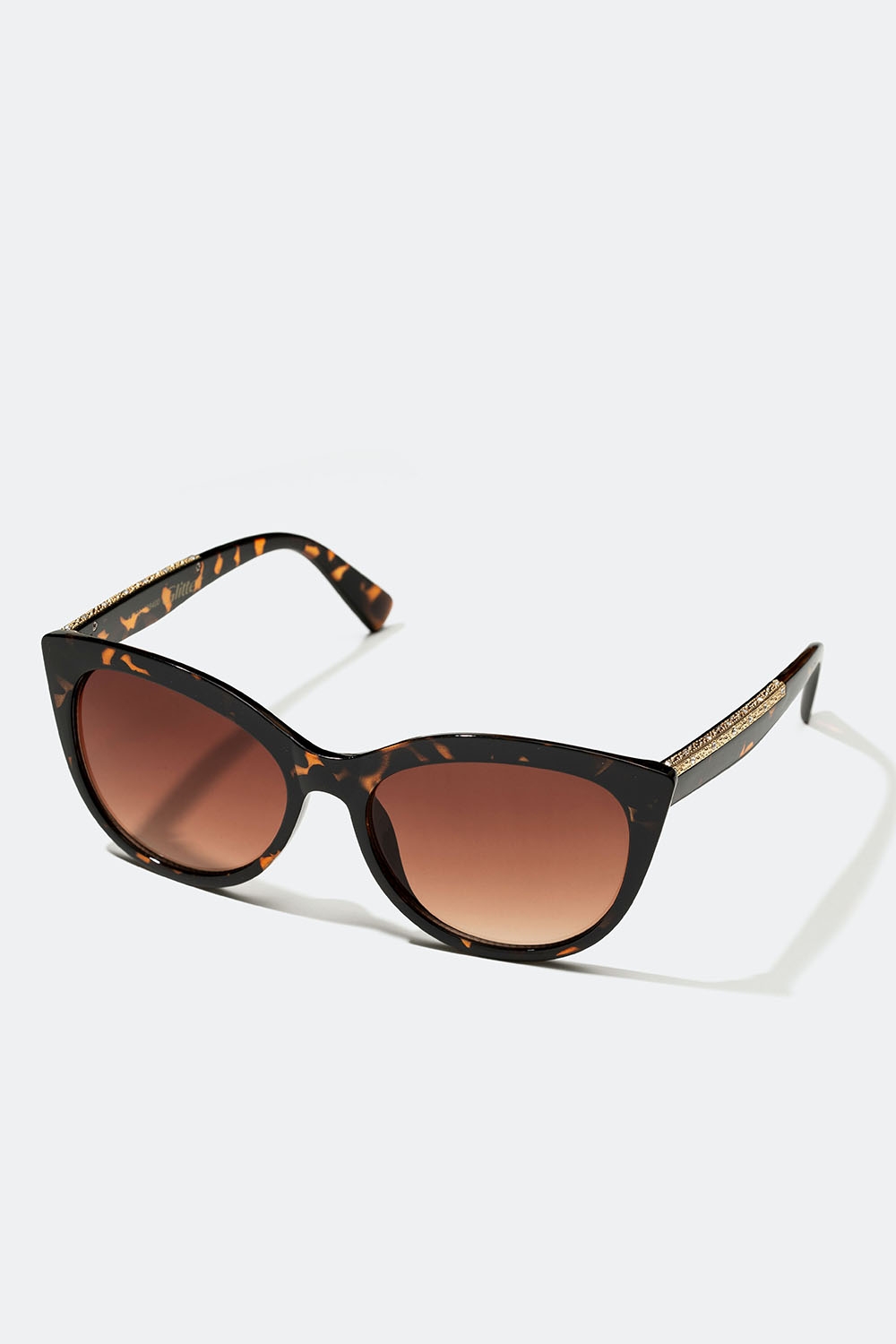 Mörkbruna solglasögon med sköldpaddsmönstrade bågar i gruppen Accessoarer / Solglasögon hos Glitter (176001208400)
