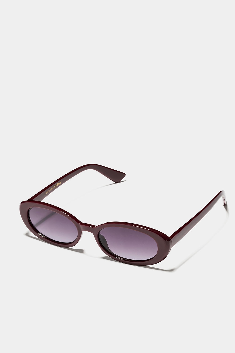 Ovala solglasögon med vinröda bågar i gruppen Accessoarer / Solglasögon hos Glitter (176001236300)