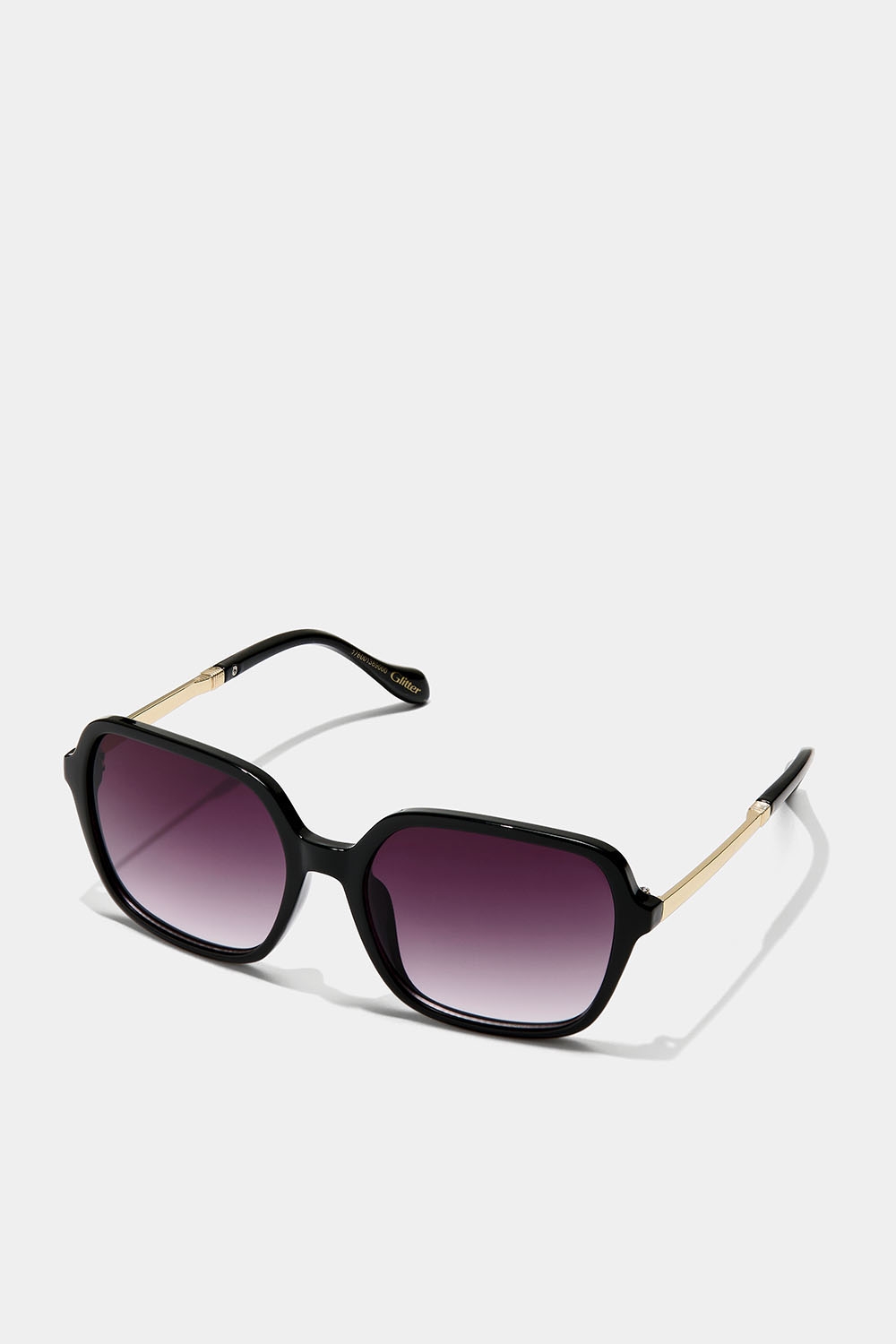 Svarta retro-inspirerade solglasögon med guldfärgad detalj i gruppen Accessoarer / Solglasögon hos Glitter (176001389000)