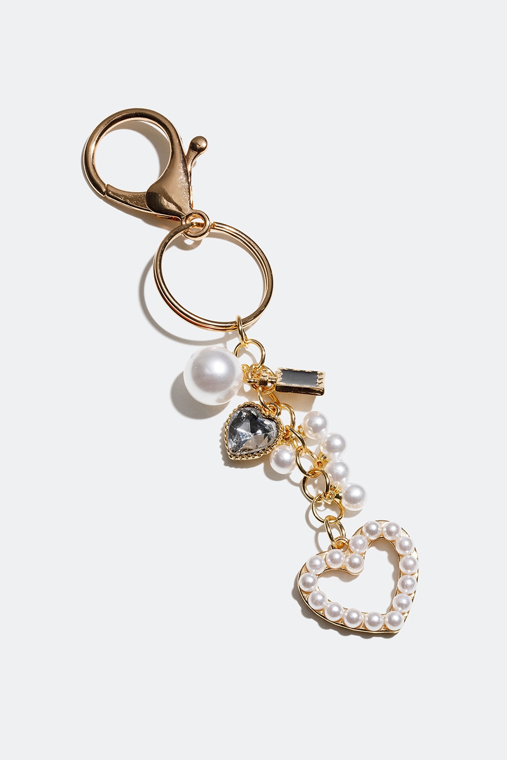 Guldfärgad nyckelring med hänge av hjärta och pärlor i gruppen Accessoarer / Nyckelringar hos Glitter (177000262000)