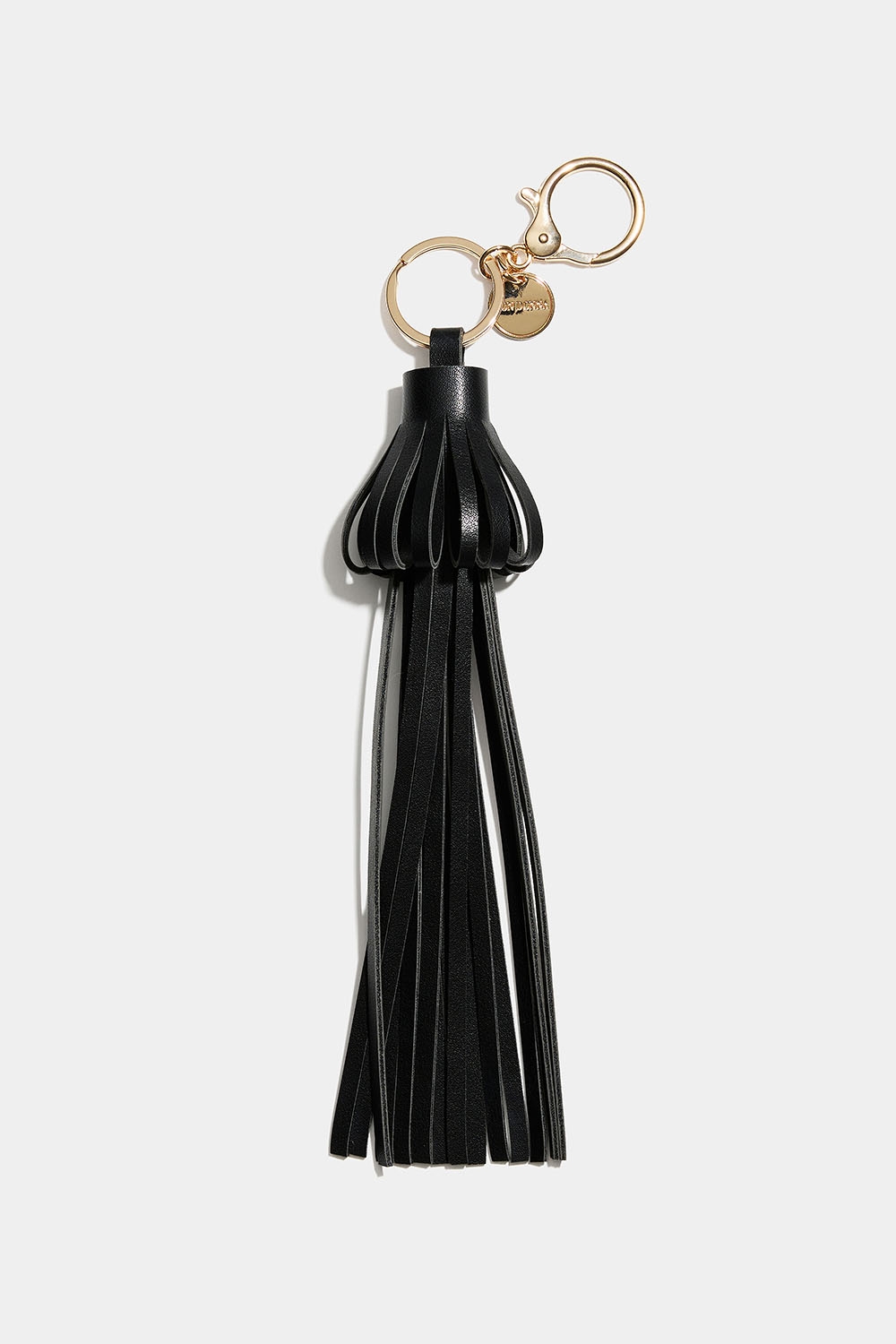 Väskdekoration med svart tofs i läderimitation i gruppen Väskor / Bag charms hos Glitter (177000789000)