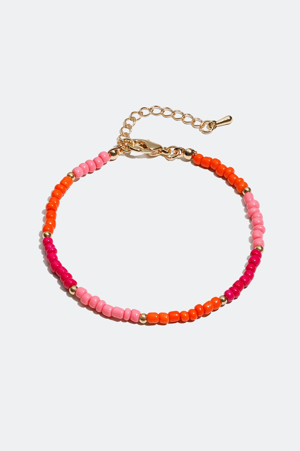 Armband med orange och rosa småpärlor i gruppen Smycken / Armband / Tunna hos Glitter (251000685402)