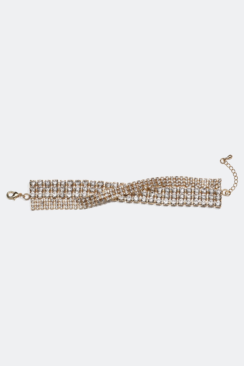 Brett guldfärgat strassarmband med korsad design i gruppen Smycken / Armband / Strass hos Glitter (251000890202)