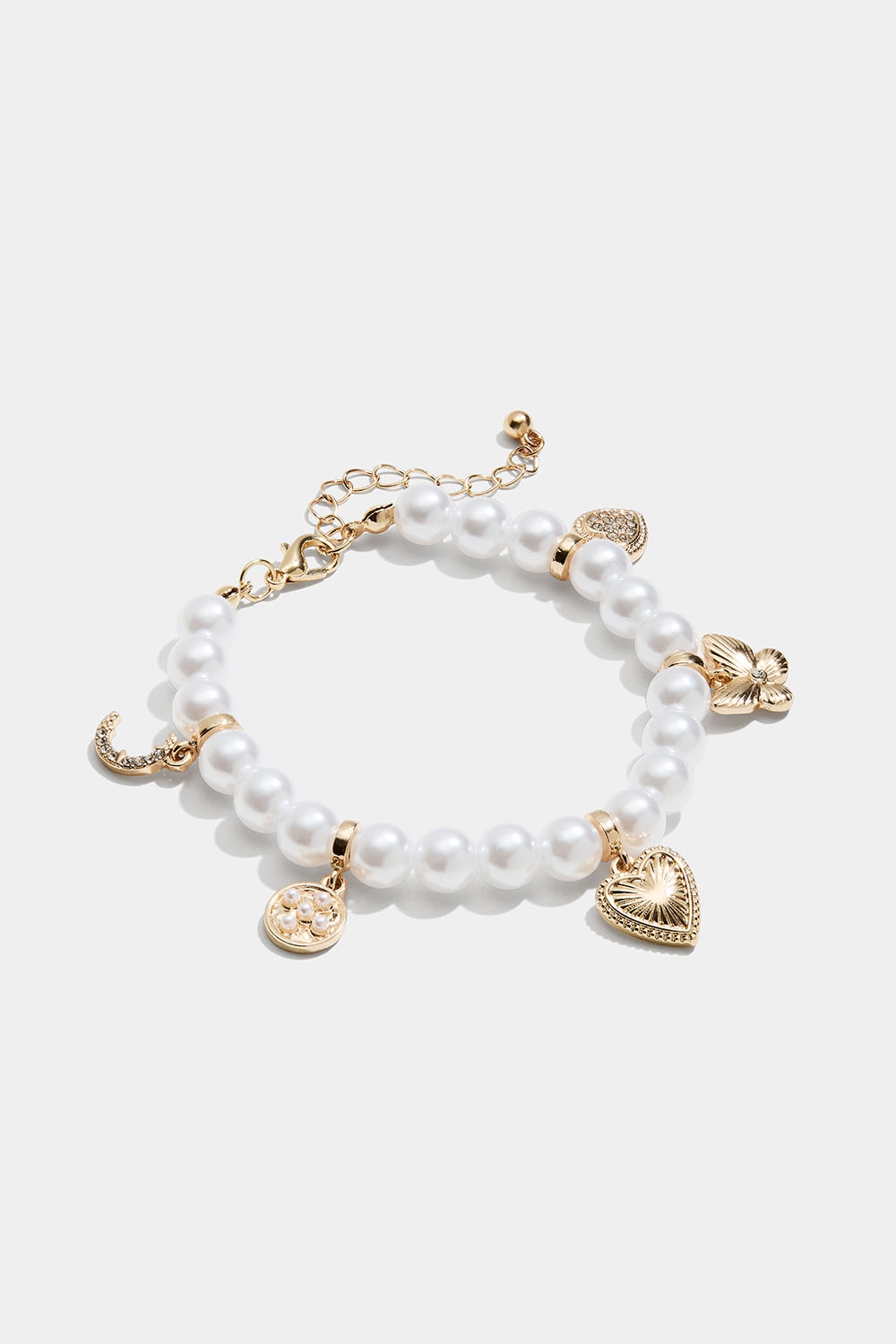 Pärlarmband med guldfärgade berlocker i gruppen Smycken / Armband hos Glitter (251001462002)