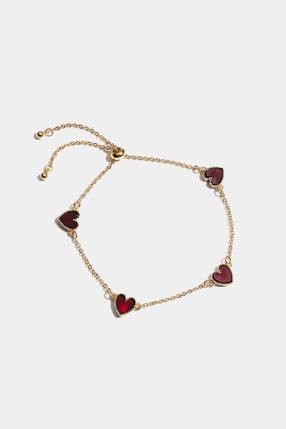 Guldfärgat armband med röda hjärtan i gruppen Store week / 2547 hos Glitter (251001656302)