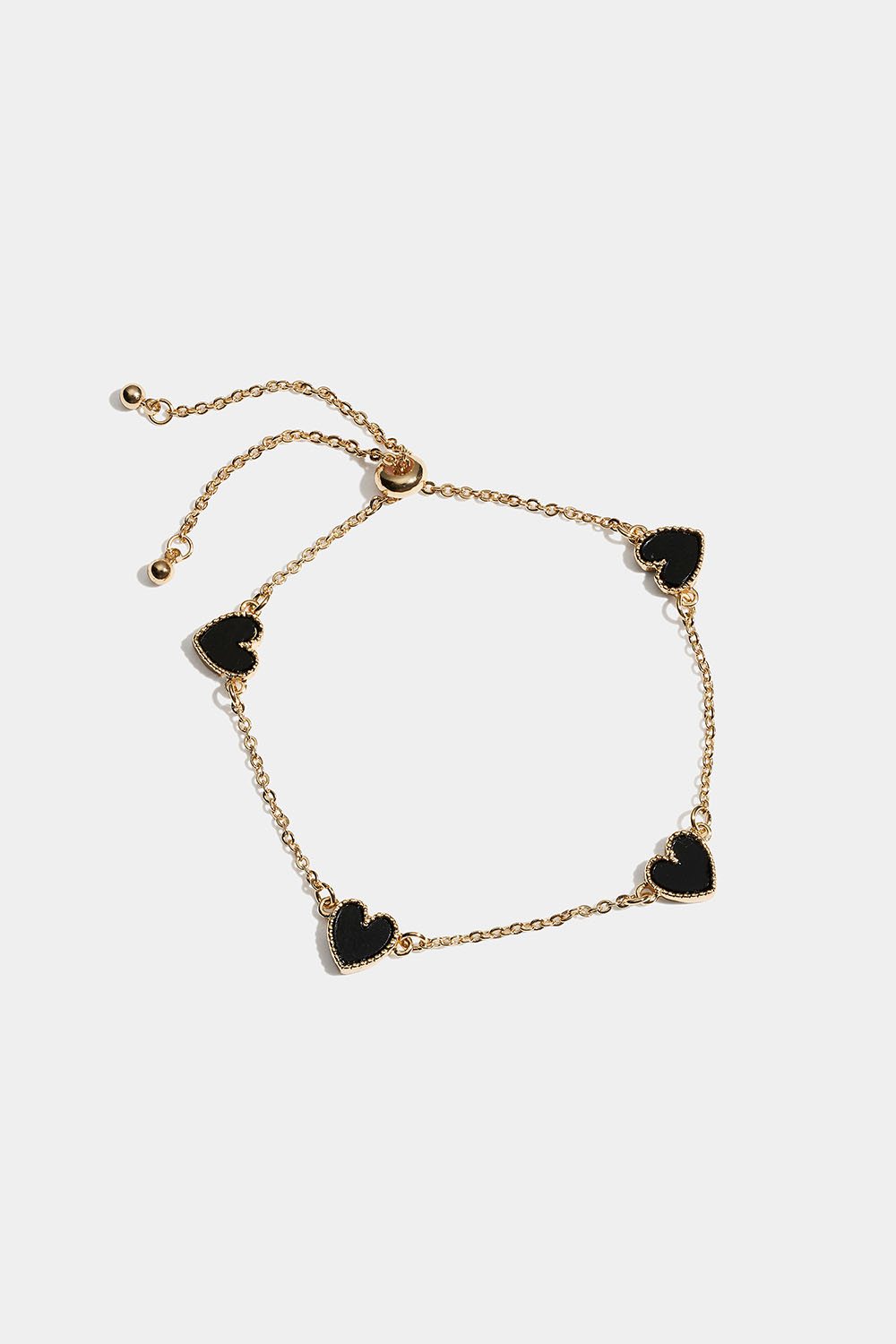 Guldfärgat armband med svarta hjärtan i gruppen Store week / 2547 hos Glitter (251001659002)