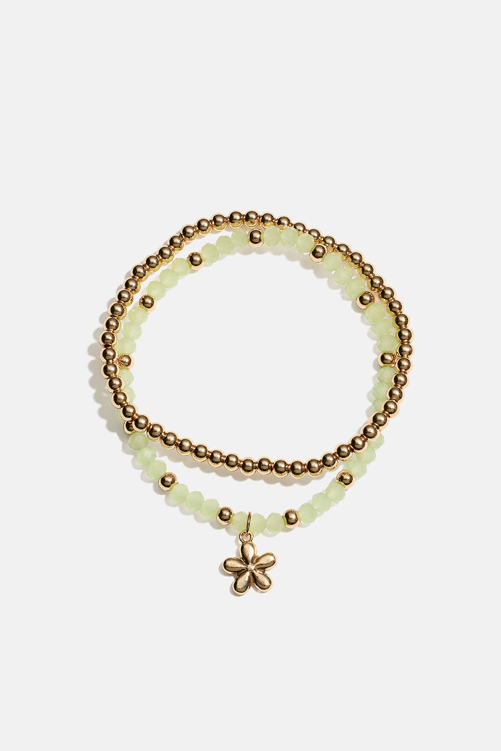 Elastiska armband med blomma och gröna och guldfärgade pärlor, 2-pack i gruppen Smycken / Armband / Flerpack hos Glitter (251001982002)