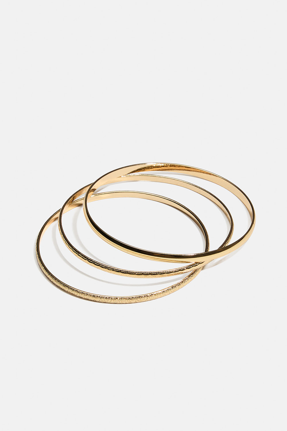 Tunna guldfärgade bangles armband, 3-pack i gruppen Smycken / Armband / Flerpack hos Glitter (251001992002)