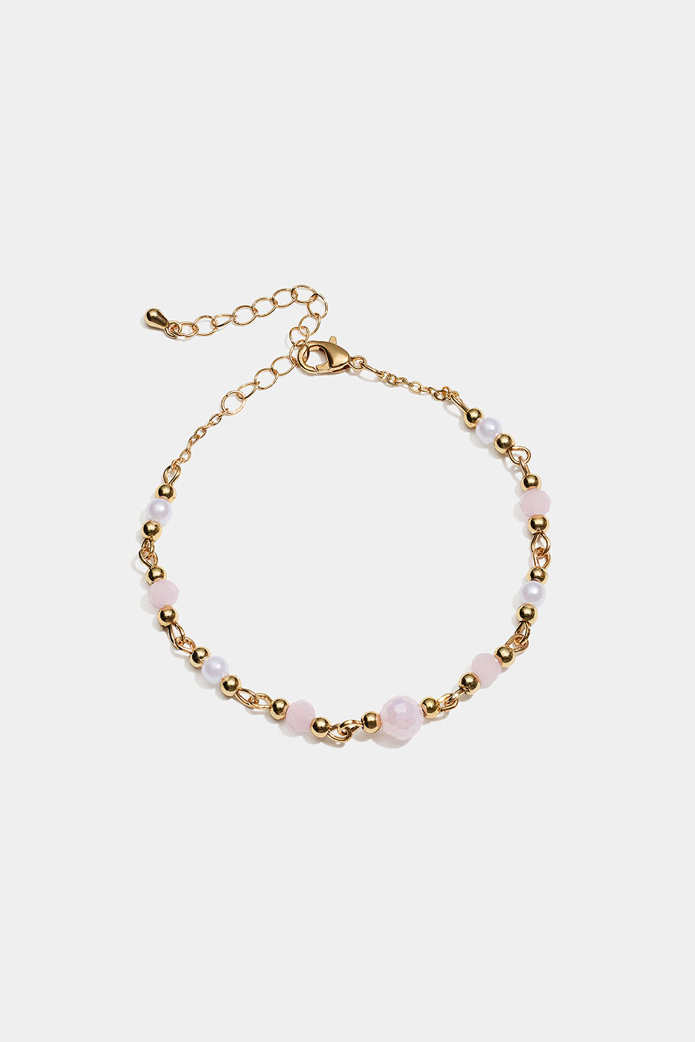 Guldfärgat armband med ljusrosa och vita pärlor i gruppen Smycken / Armband hos Glitter (251002295002)