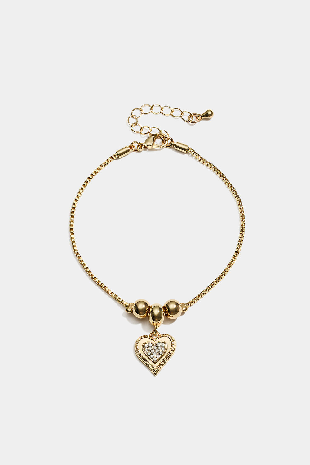 Guldfärgat armband med hjärtformad berlock i gruppen Smycken / Armband hos Glitter (251002302002)