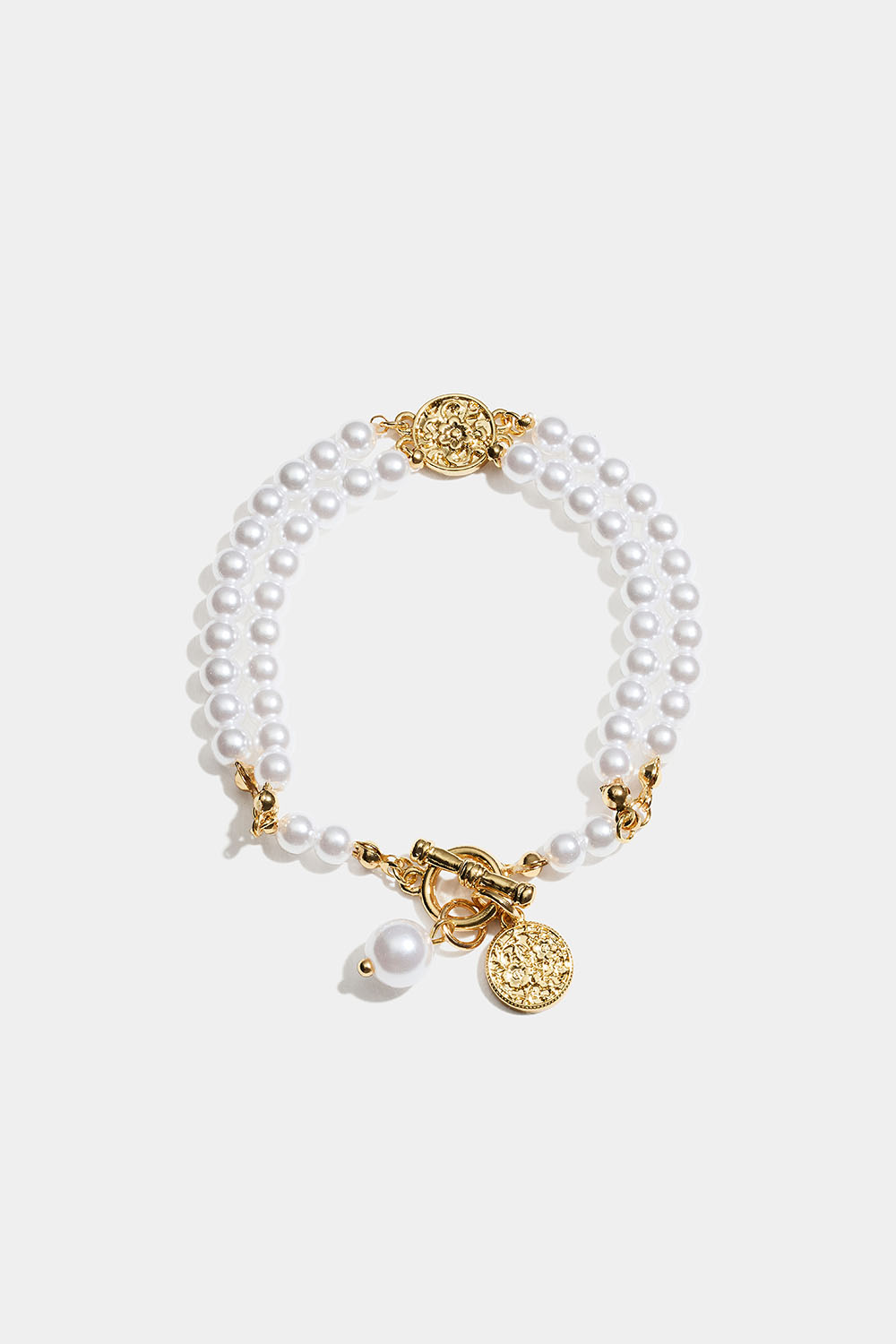 Pärlarmband med T-lås och pärlberlock i gruppen Smycken / Armband hos Glitter (251002432000)