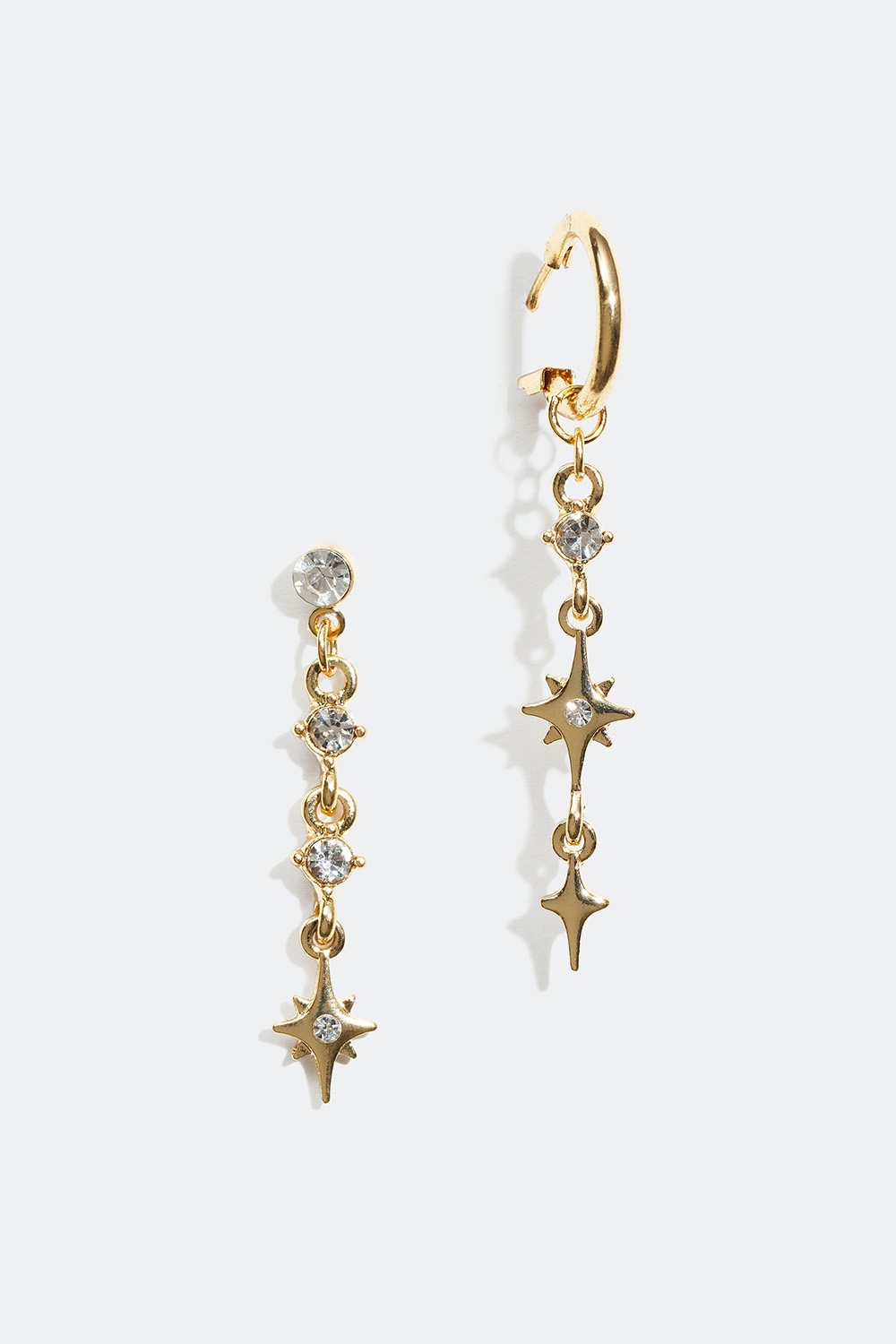 Långa örhängen med stjärna och glasstenar i gruppen Alla Smycken / Örhängen hos Glitter (25300163)