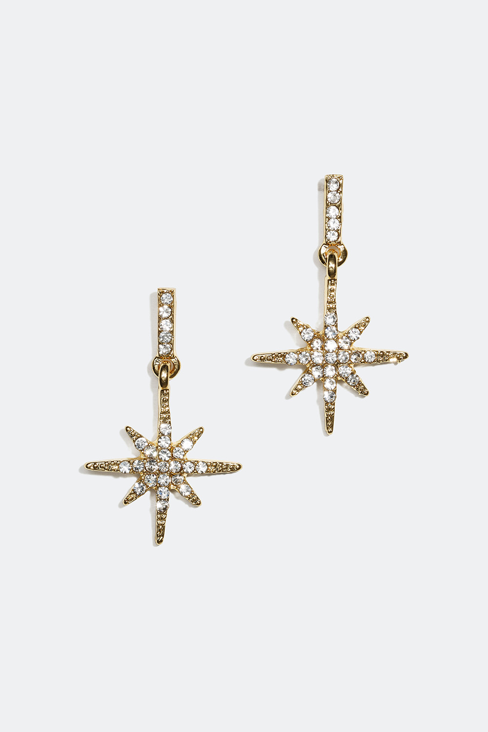 Guldfärgade örhängen med stjärna och glasstenar i gruppen Smycken / Örhängen hos Glitter (25300188)