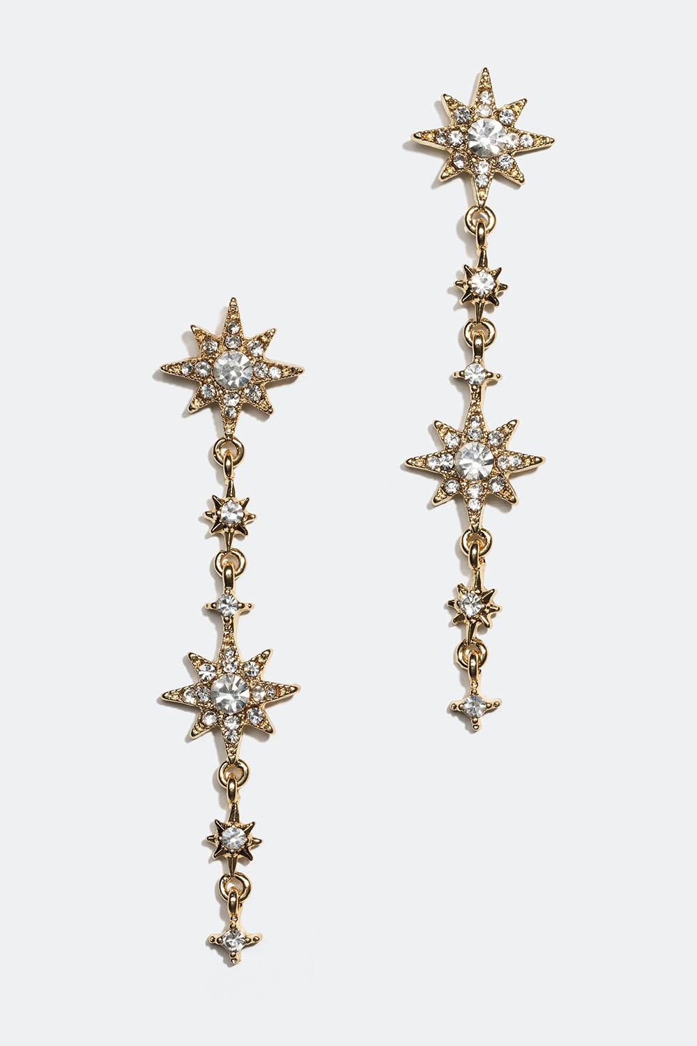 Långa guldfärgade strassörhängen med stjärnor i gruppen Smycken / Örhängen / Strass hos Glitter (253005250202)