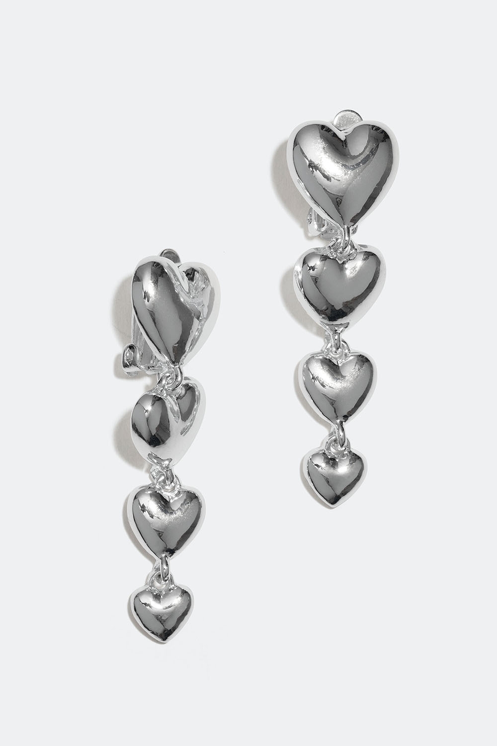 Clipsörhängen med hängande hjärtan i gruppen Smycken / Örhängen / Clips hos Glitter (253005441001)