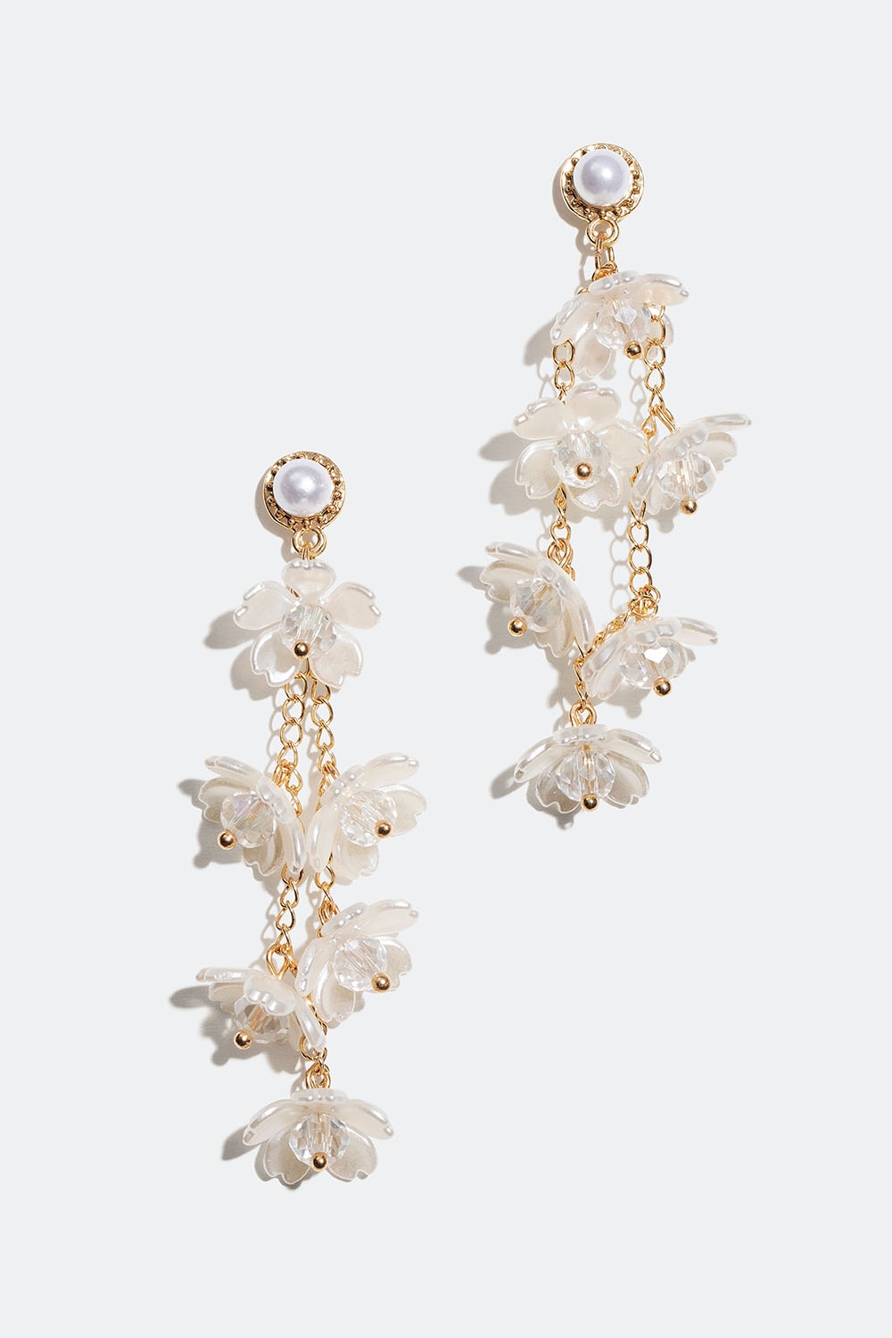 Långa örhängen med två hängen av vita blommor i gruppen Smycken / Örhängen hos Glitter (253006143002)