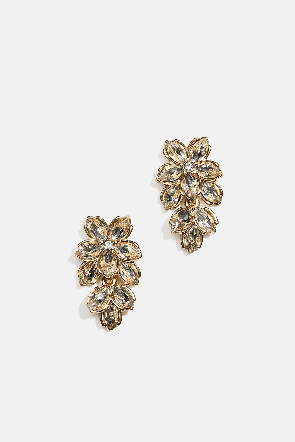 Guldfärgade örhängen med blommor, glasstenar och blad i gruppen Store week / 2545 hos Glitter (253010270202)