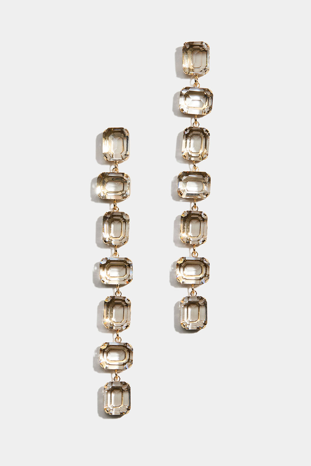 Örhängen med rektangulära vita stenar i gruppen Smycken / Örhängen / Strass hos Glitter (253010340202)