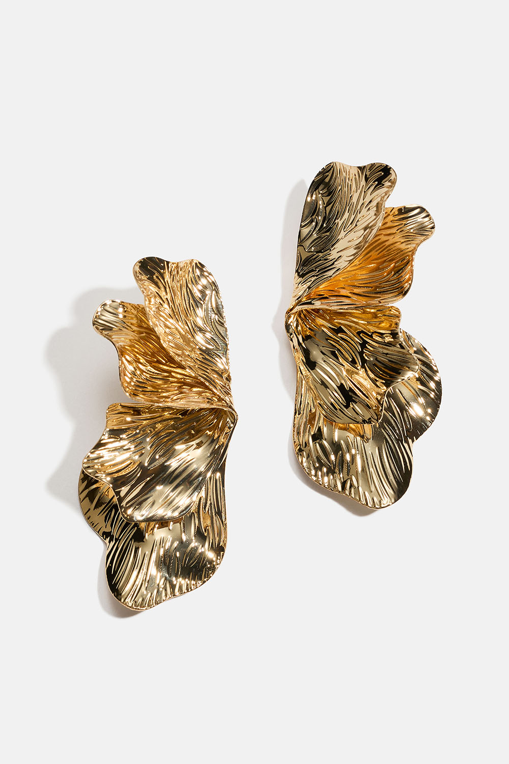 Blombladsformade guldfärgade clipsörhängen i gruppen Smycken / Örhängen / Clips hos Glitter (253011312002)