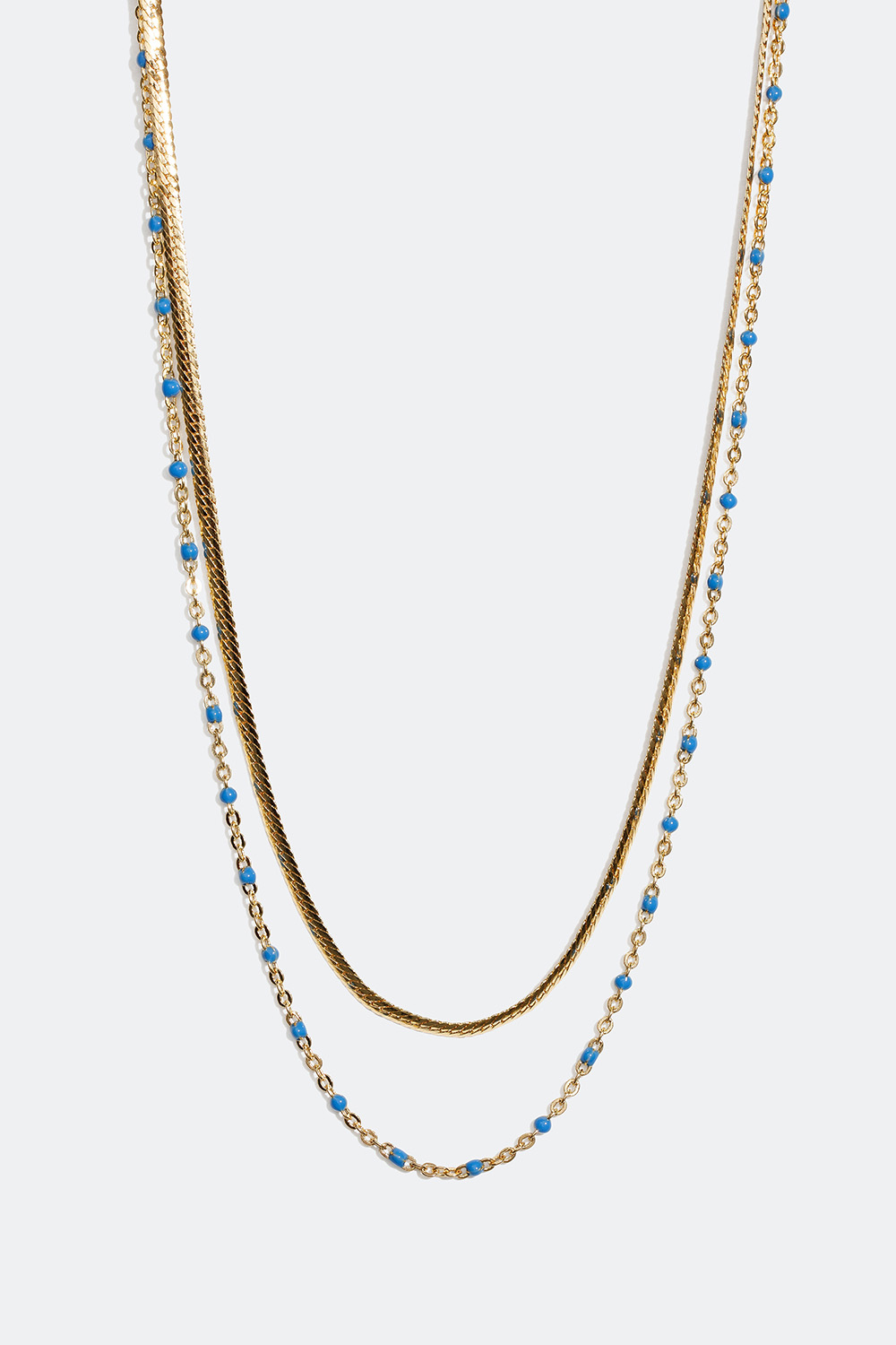 Guldfärgat dubbelhalsband med detaljer i blått i gruppen Smycken / Halsband hos Glitter (254000857002)