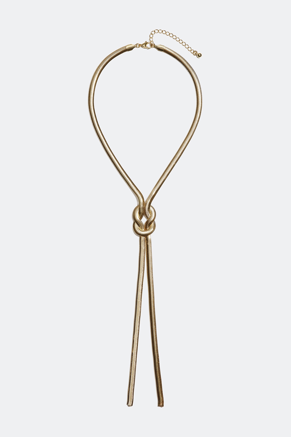 Långt guldfärgat halsband med tät kedja och knut i gruppen Smycken / Halsband hos Glitter (254001112002)