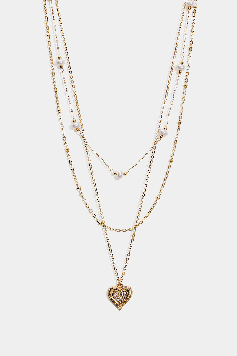 Guldfärgat lager-på-lager halsband med pärlor och hjärtformad berlock i gruppen Smycken / Halsband / Halsband med hänge hos Glitter (254002872002)