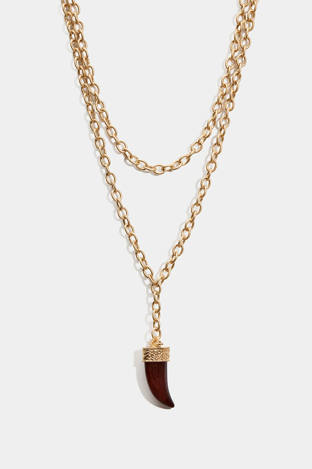 Guldfärgat halsband med vinröd tandsberlock i gruppen Smycken / Halsband / Halsband med hänge hos Glitter (254002952000)