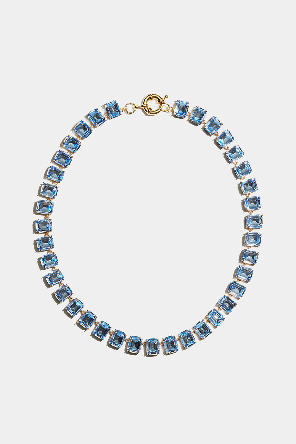 Halsband med baguetteformade glasstenar i ljusblått i gruppen Smycken / Halsband hos Glitter (254003057100)