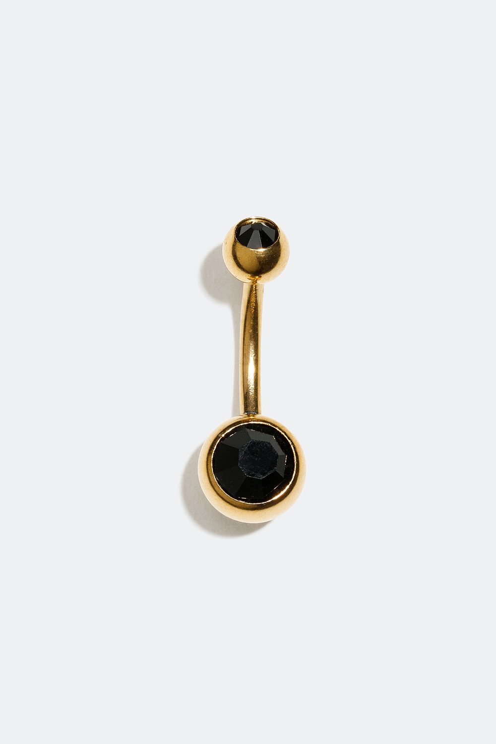 Guldfärgad navelpiercing med två svarta stenar i gruppen Smycken / Piercings / Navelpiercings hos Glitter (255000468410)