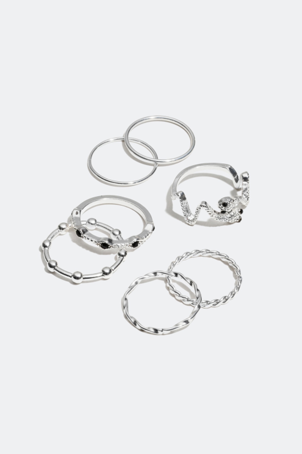 7-pack ringar med ormmotiv och tvinnad design i gruppen Alla Smycken / Ringar / Flerpack hos Glitter (25600014)
