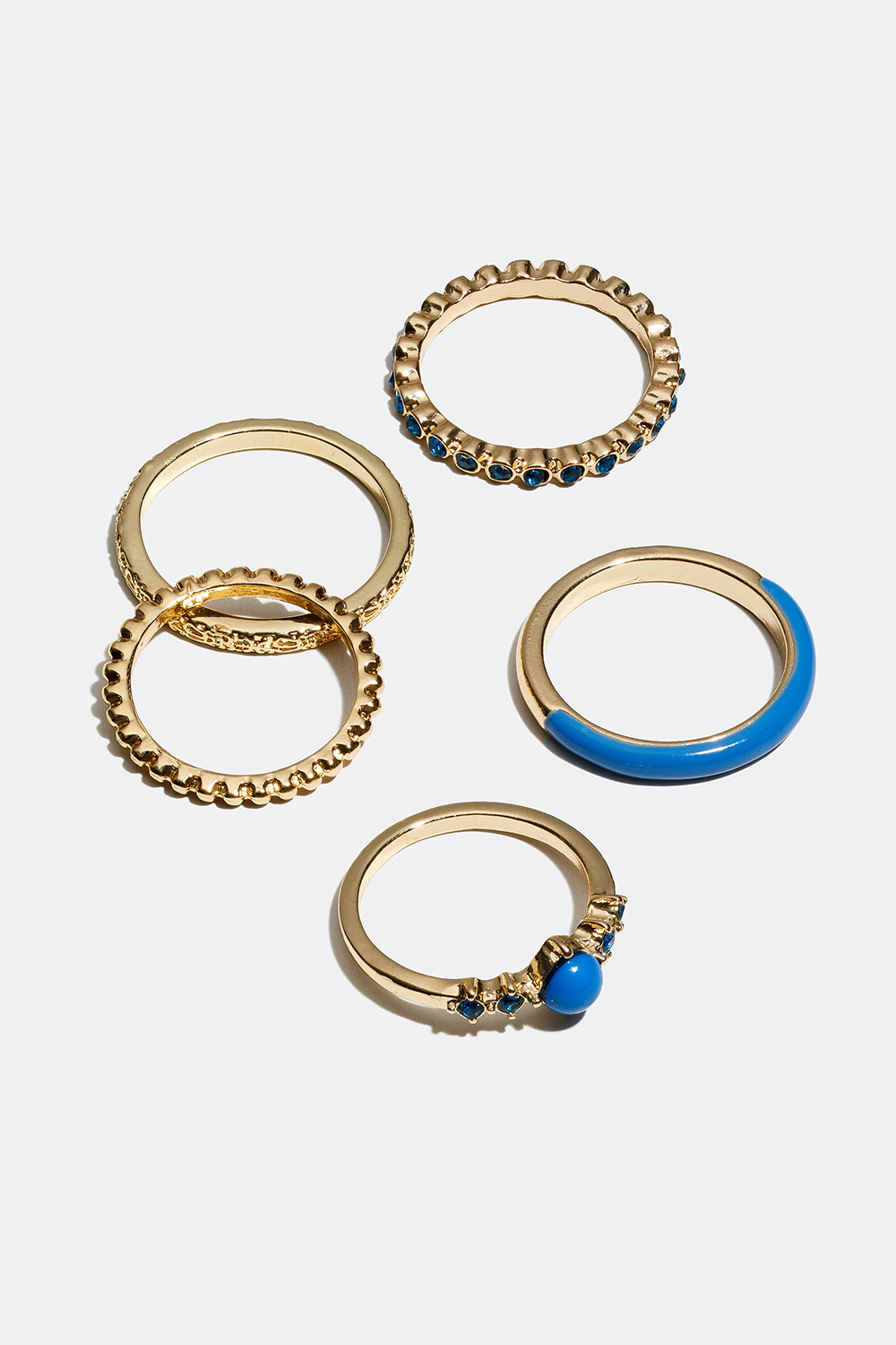Guldfärgade ringar med detaljer i blått, 5-pack i gruppen Smycken / Ringar / Flerpack hos Glitter (256000627)