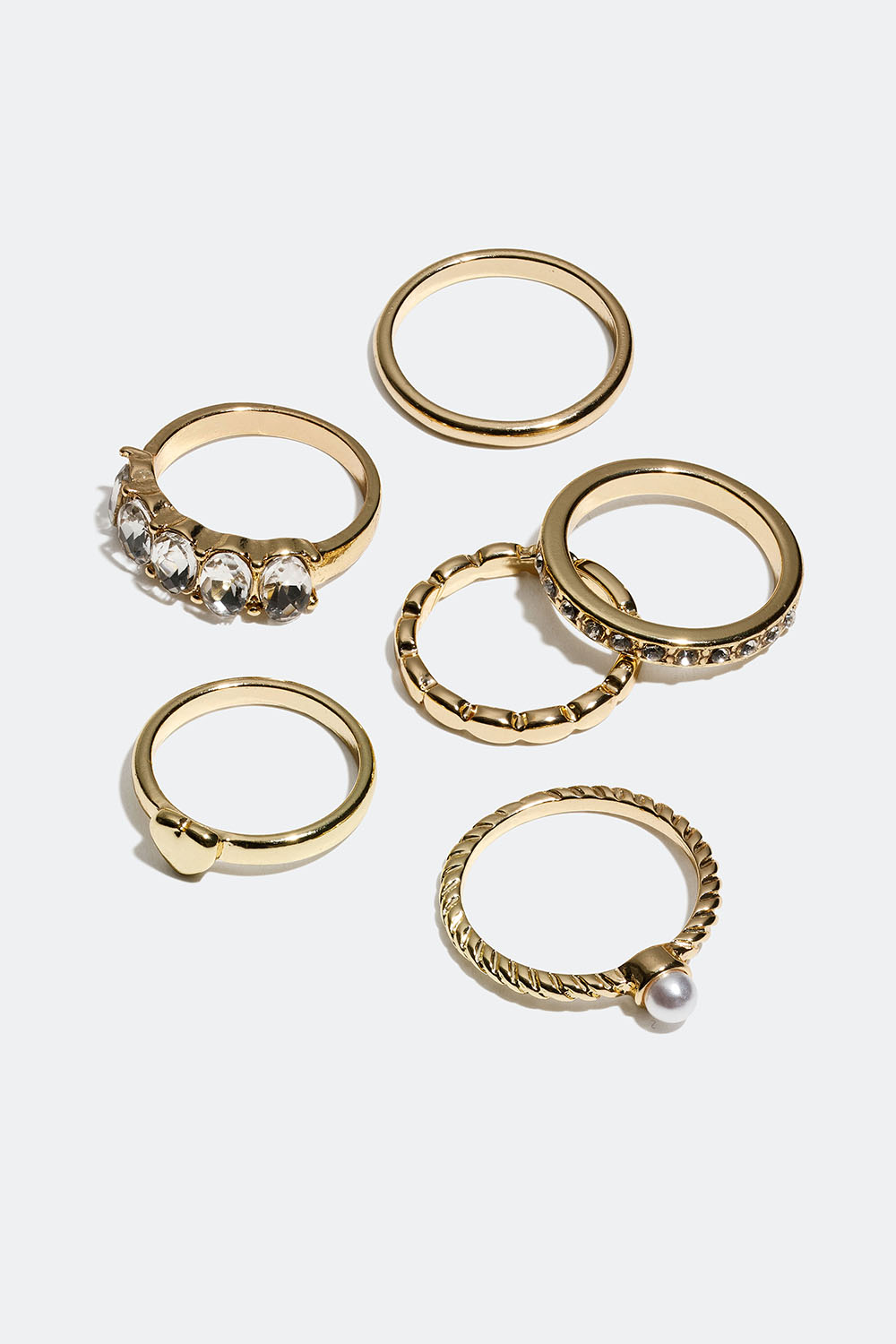 Guldfärgade ringar med glasstenar och pärla, 6-pack i gruppen Smycken / Ringar / Flerpack hos Glitter (256000652)