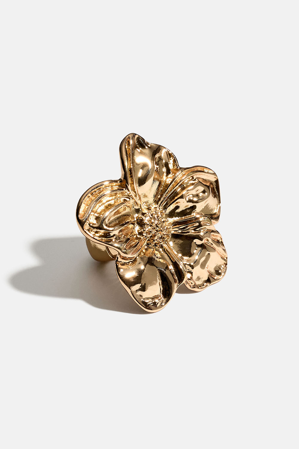 Justerbar guldfärgad ring med blomma i gruppen Smycken / Ringar hos Glitter (256001742000)