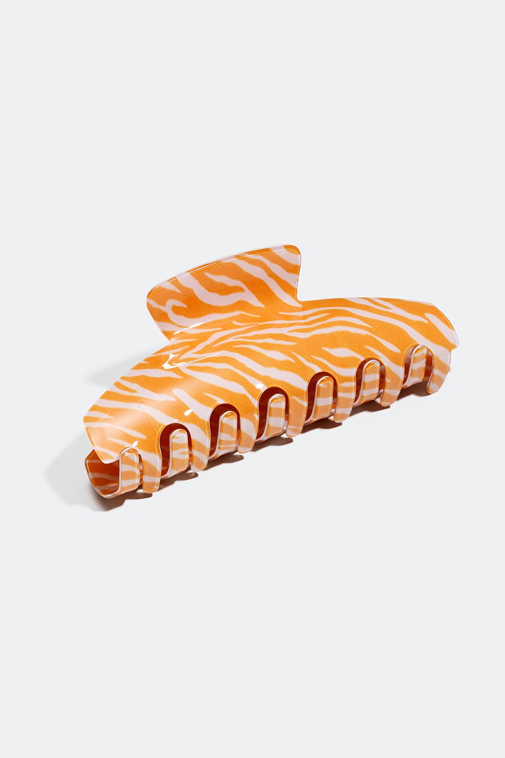 Orange hårklämma med zebramönster i gruppen Håraccessoarer / Spännen & klämmor / Hårklämmor hos Glitter (331001224800)