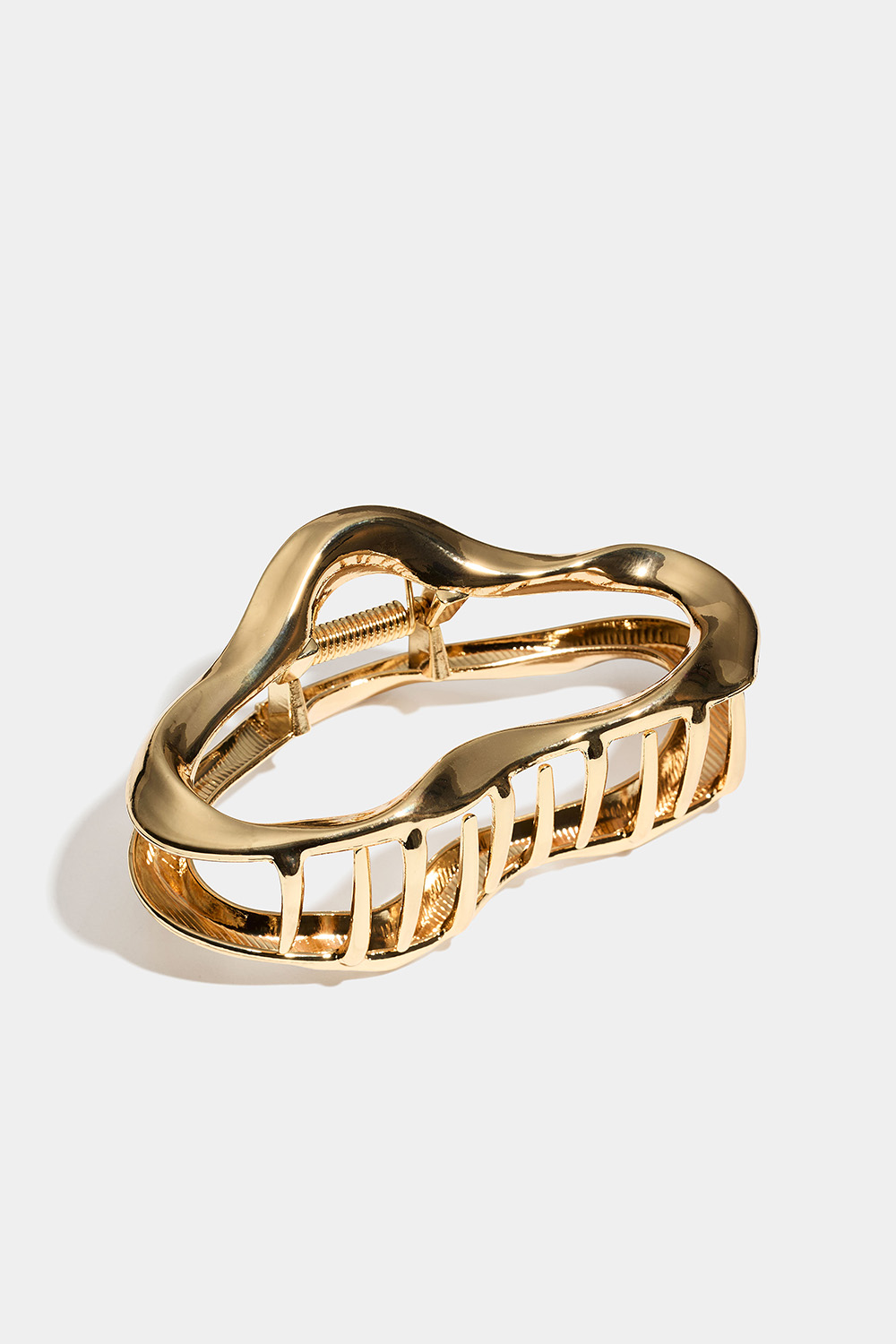 Guldfärgad hårklämma i organisk form i gruppen Håraccessoarer / Spännen & klämmor / Hårklämmor hos Glitter (331001842000)