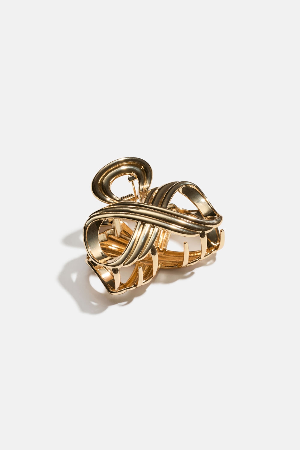 Guldfärgad hårklämma i metall med runda former i gruppen Håraccessoarer / Spännen & klämmor / Hårklämmor hos Glitter (331002002000)