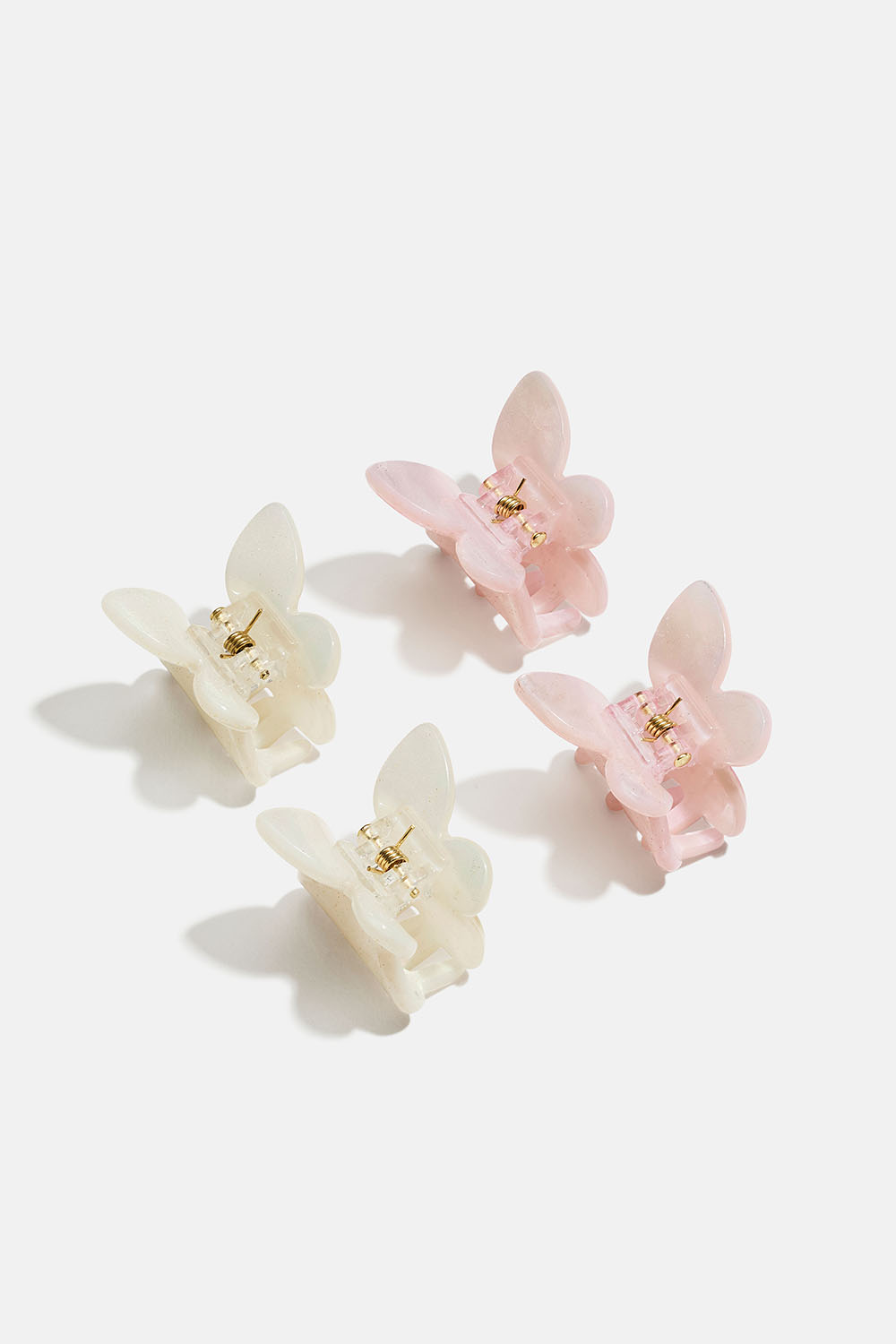 Små hårklämmor med rosa och vita fjärilar, 4-pack i gruppen Håraccessoarer / Spännen & klämmor / Flerpack hos Glitter (331002085400)