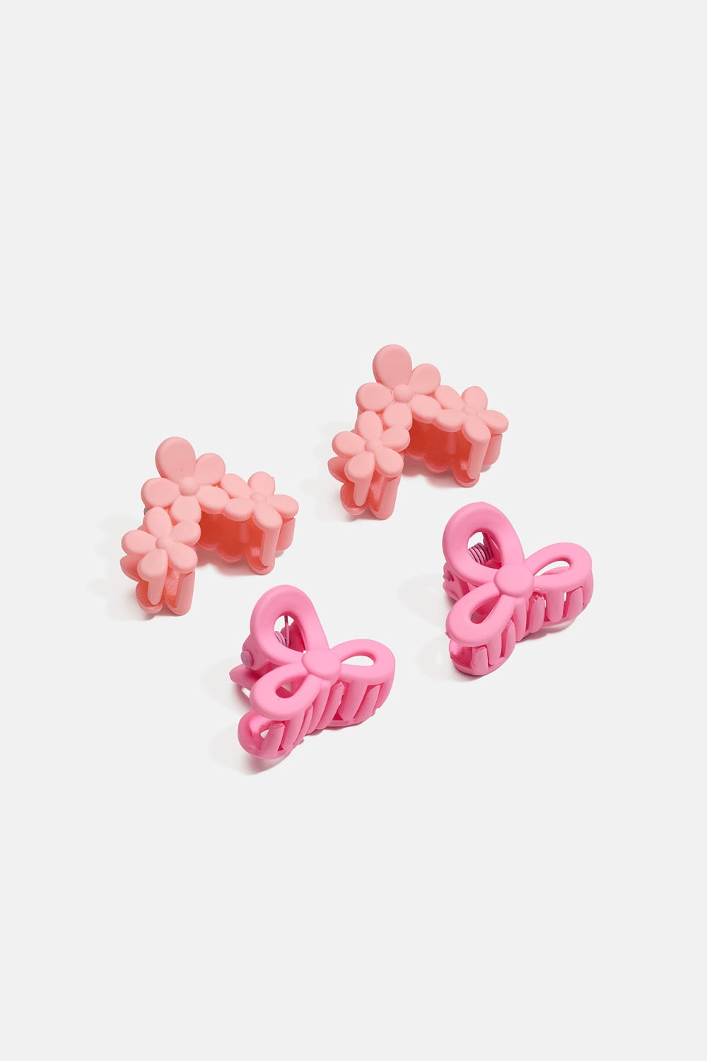Små rosa hårklämmor med blommor och rosetter, 4-pack i gruppen Barn / Barnhåraccessoarer / Barnhårspännen hos Glitter (403000459900)