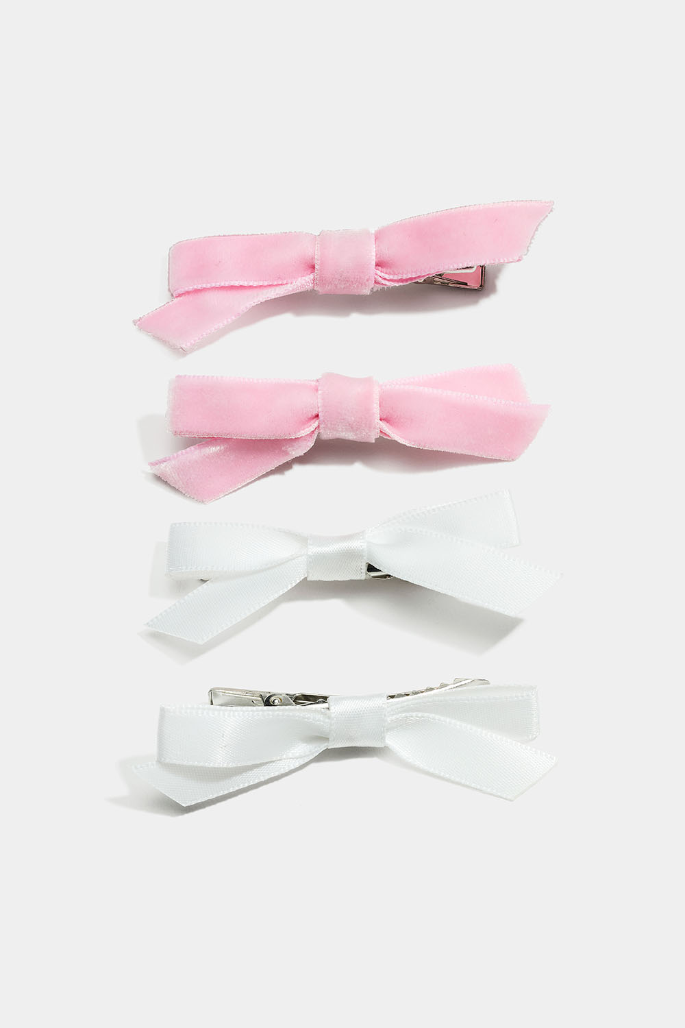 Hårspännen med rosetter i rosa och vitt, 4-pack i gruppen Barn / Barnhåraccessoarer / Barnhårspännen hos Glitter (403000585400)