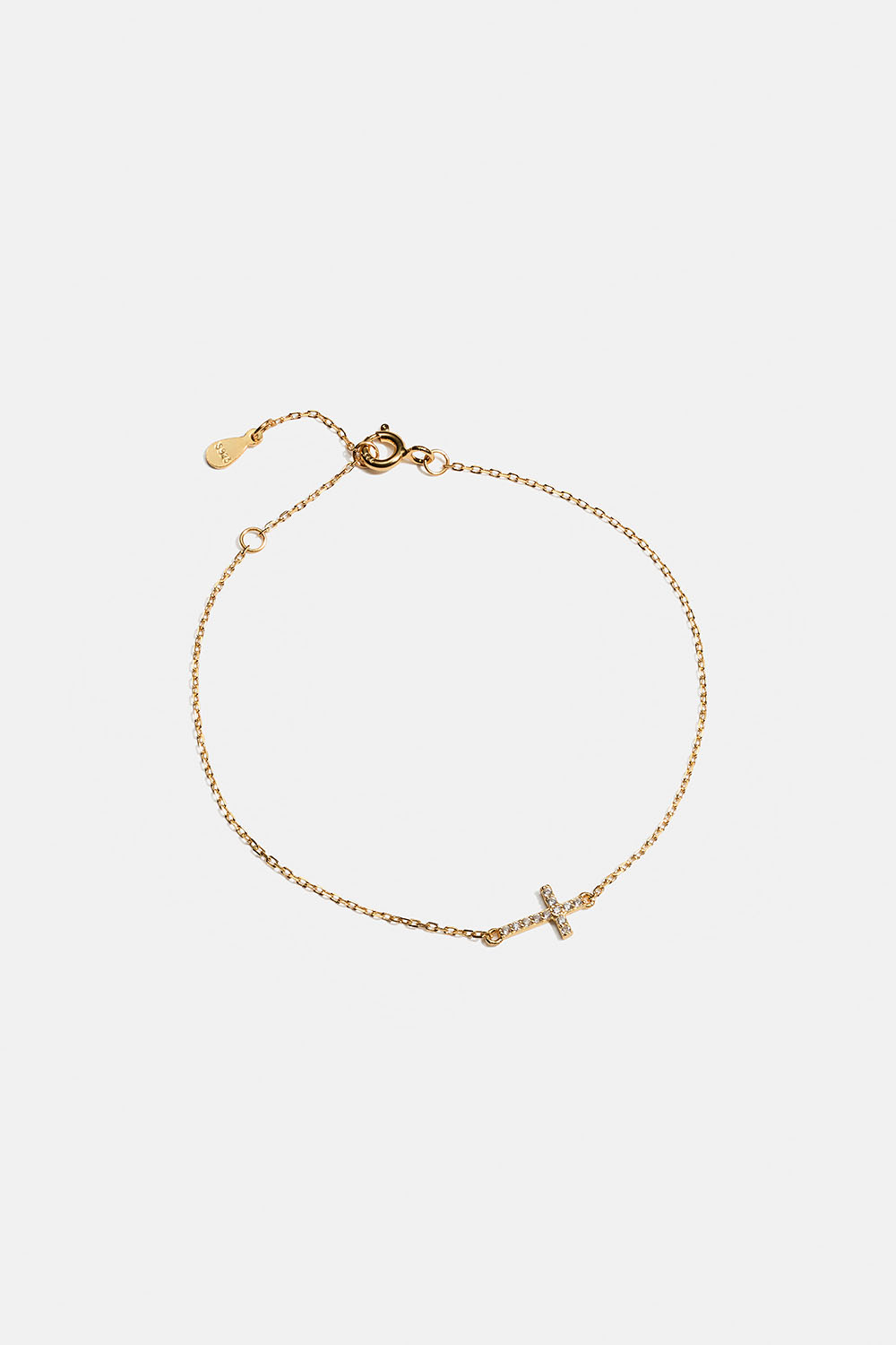 Armband i 18k guldpläterat äkta silver med kors och Cubic Zirconia i gruppen Guldpläterat äkta silver / Guldpläterade armband hos Glitter (551001022002)