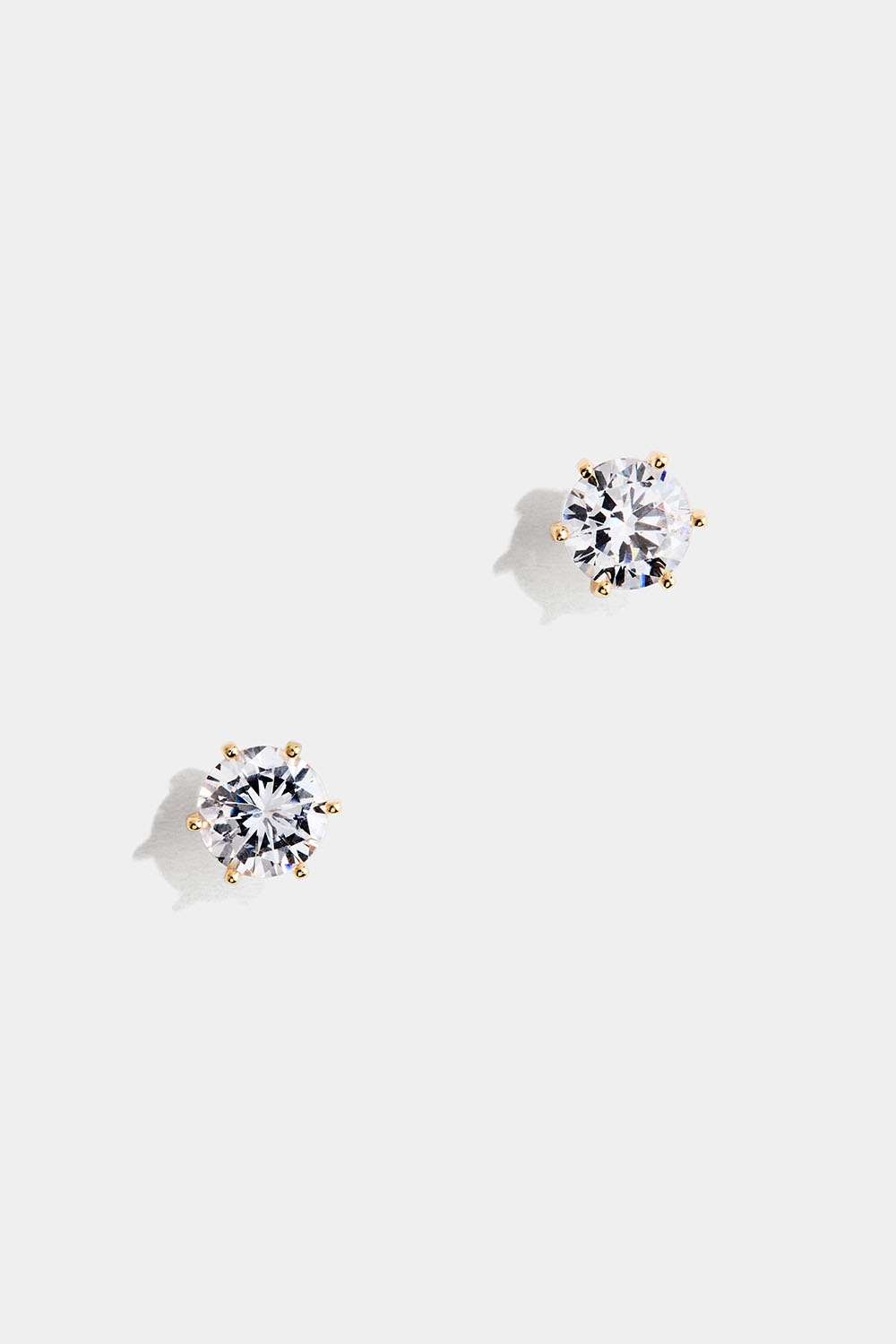 Studs i 18k guldpläterat äkta silver med rund Cubic Zirconia i gruppen 18k Guldpläterat silver / Örhängen i 18k guld hos Glitter (553003882002)