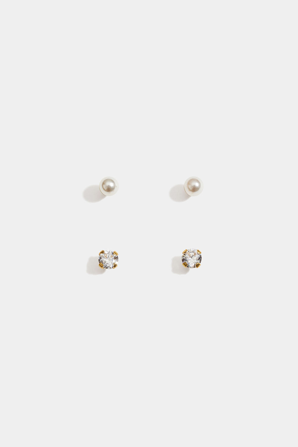 Små studs i 18k guldpläterat äkta silver med pärlor och Cubic Zirconia, 2-pack i gruppen Guldpläterat äkta silver / Guldpläterade örhängen hos Glitter (553006302000)