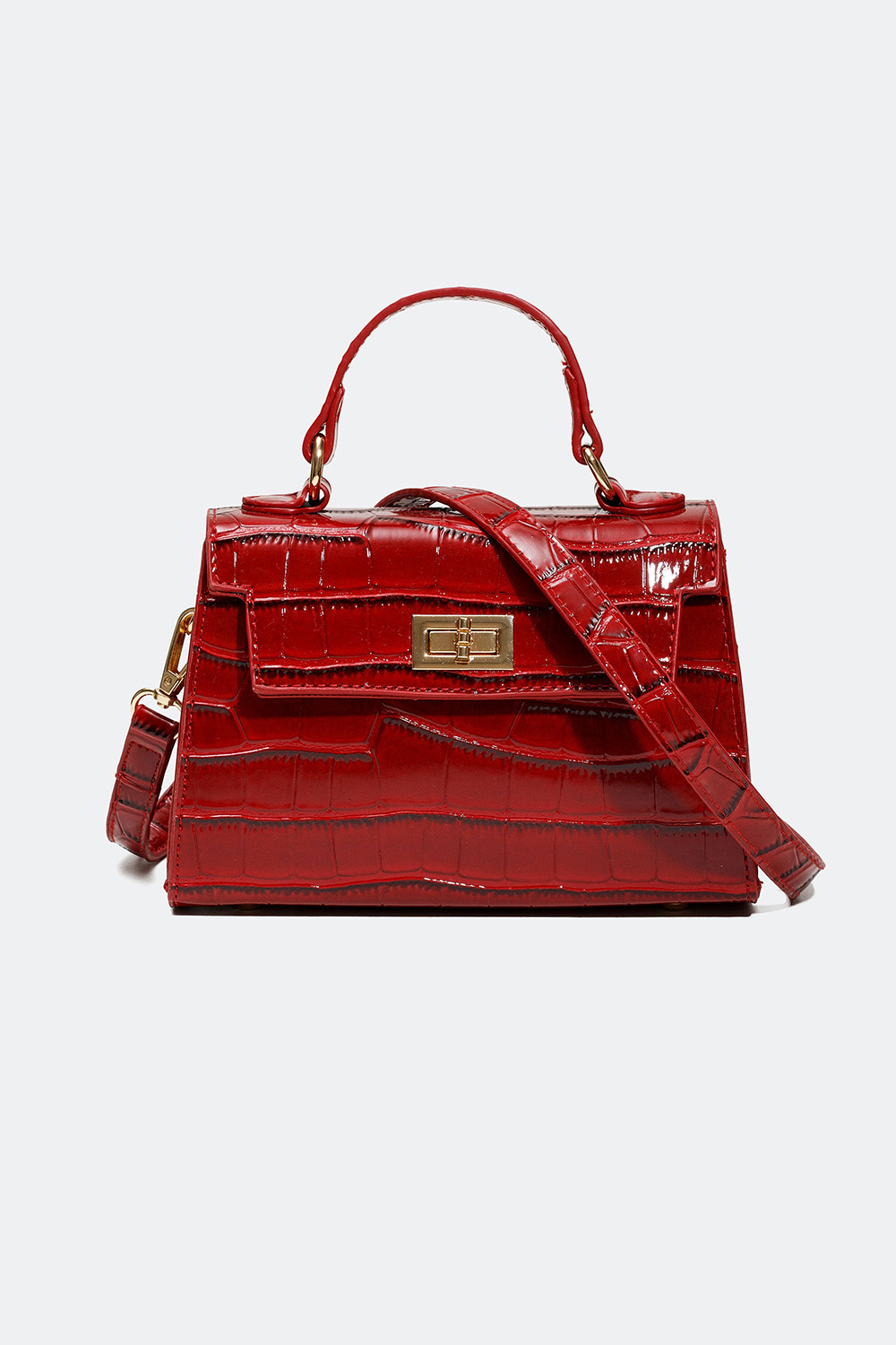 Liten röd handväska med crocomönster