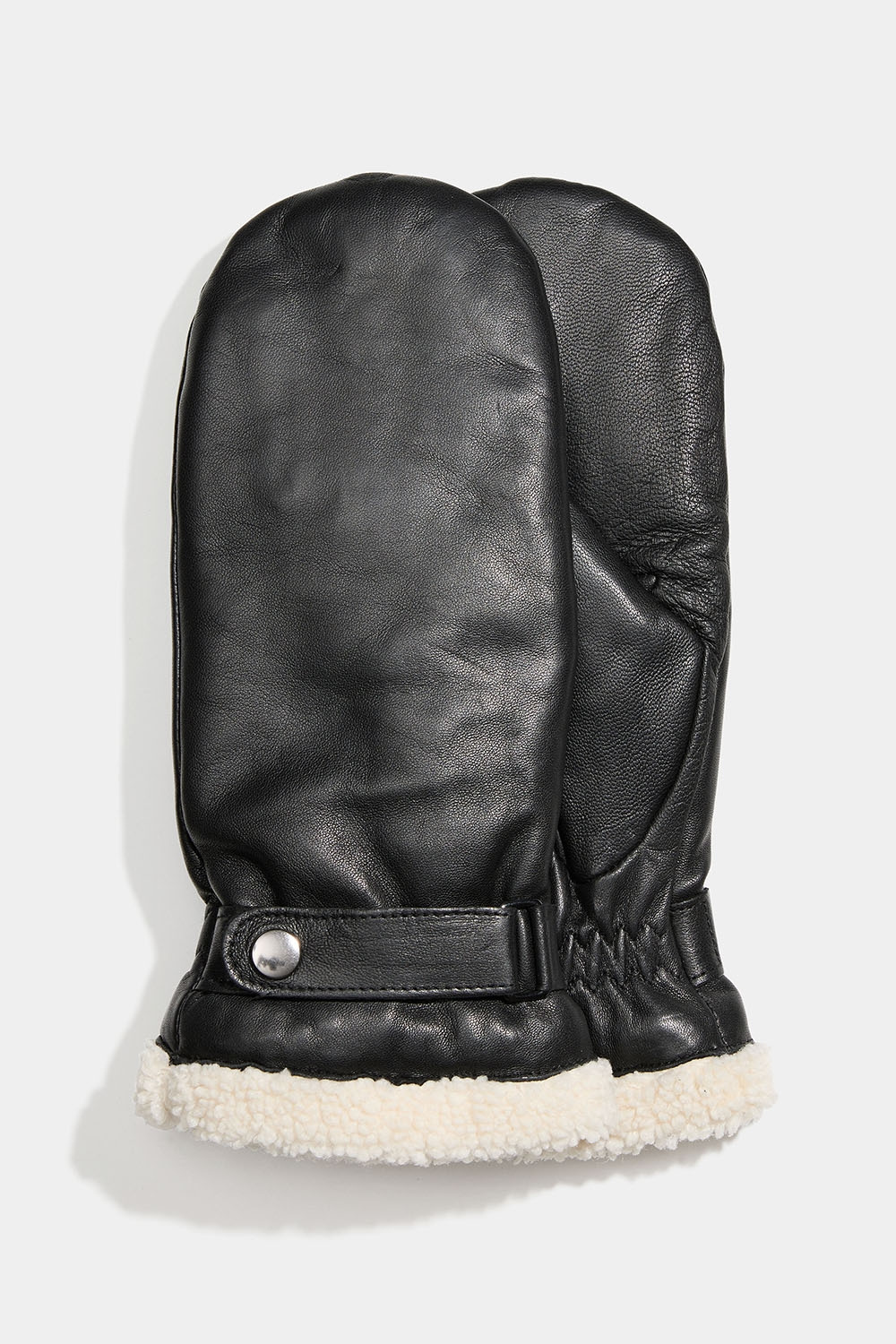 Svarta tumhanskar i skinn med faux shearling