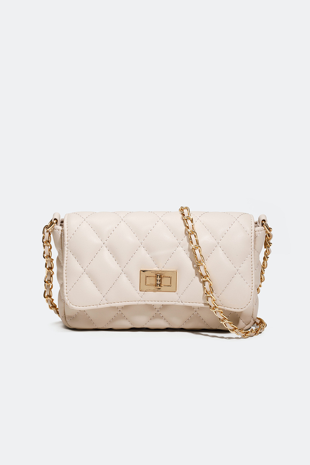 Beige quiltad axelremsväska