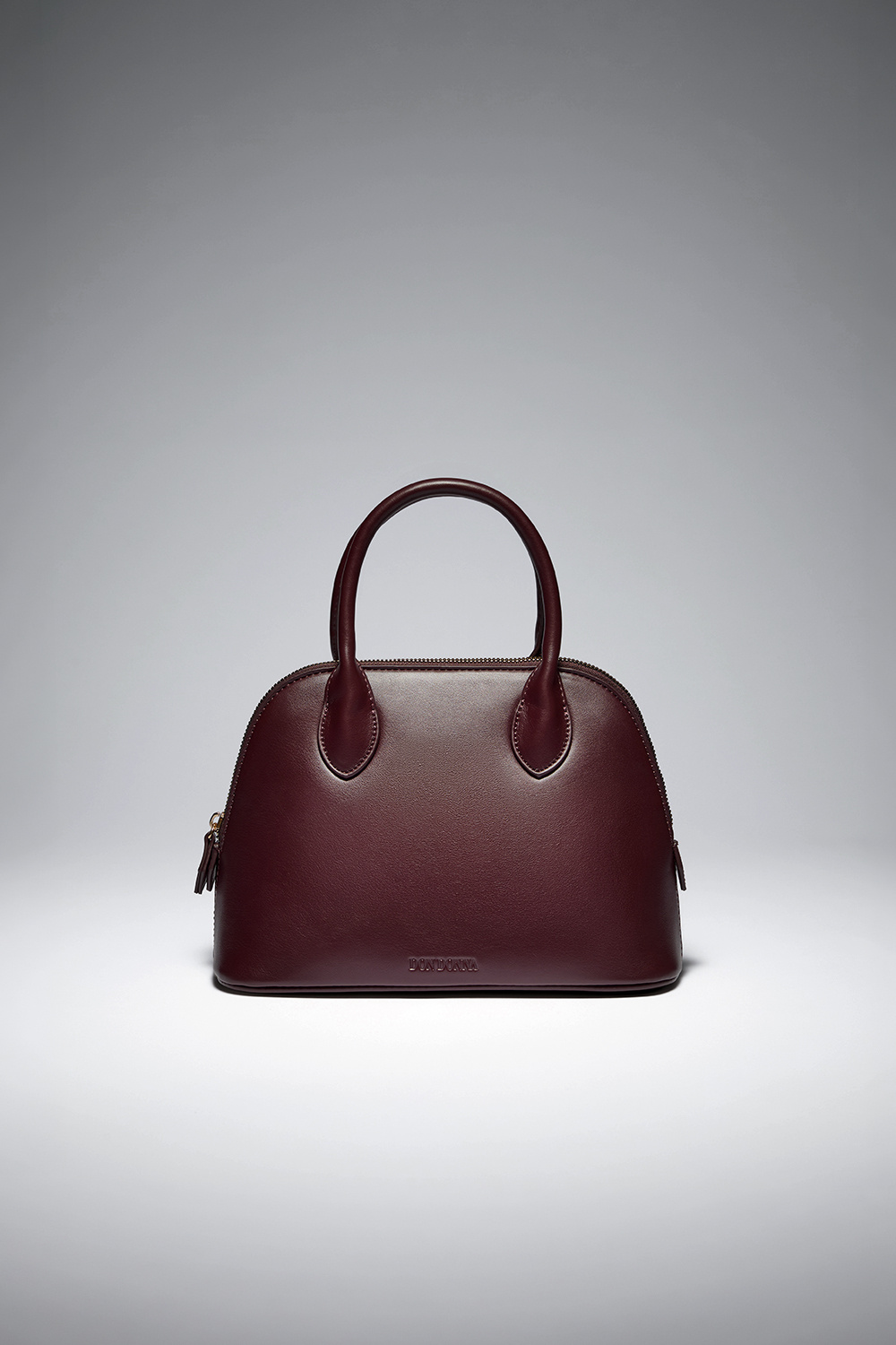 Vinröd bowlingväska