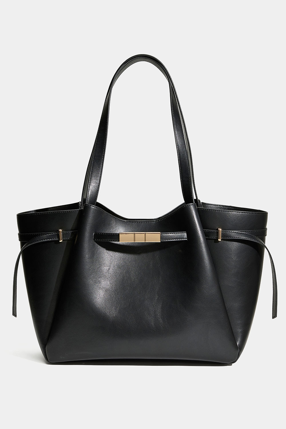 Svart shopper med gulddetaljer